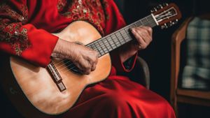 Old Woman Playing a Nylon String Acoustic Guitar - Free Download